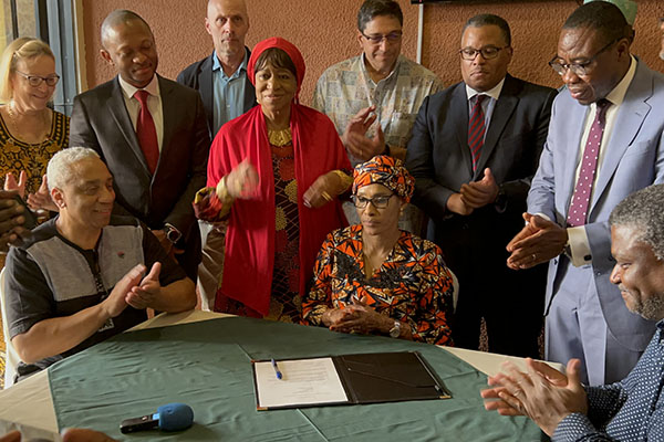 Signing a health improvement agreement with First Lady of the Republic of Gambia, Minister of Health, SCCM President, and Economic Community of West African States (ECOWAS) leadership