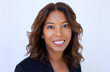 A professional headshot of Dr. Allison Lee, MD, MS, a Professor of Anesthesiology at Columbia University and an expert in maternal health equity. She has shoulder-length wavy brown hair and is smiling warmly, wearing a black professional blazer against a clean white background.